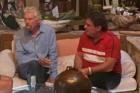 Dr. Paul A. Pereira with global business leaders